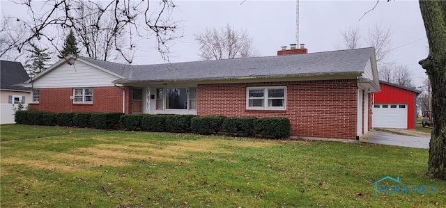 ranch-style house with a garage and a front lawn