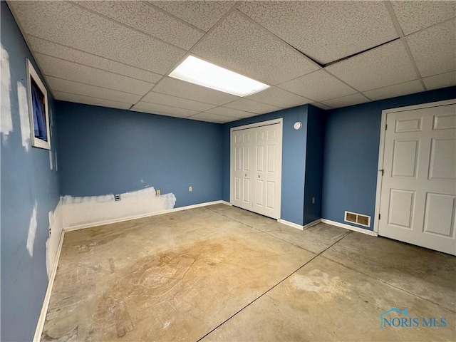 basement with a drop ceiling