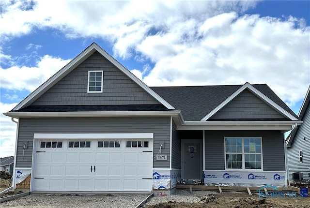 craftsman-style house with driveway