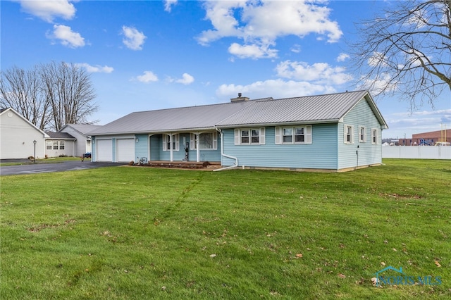 ranch-style home with a porch, a garage, and a front lawn