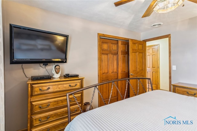 bedroom featuring a closet and ceiling fan