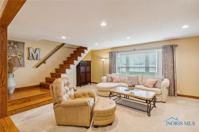 living room with light hardwood / wood-style floors