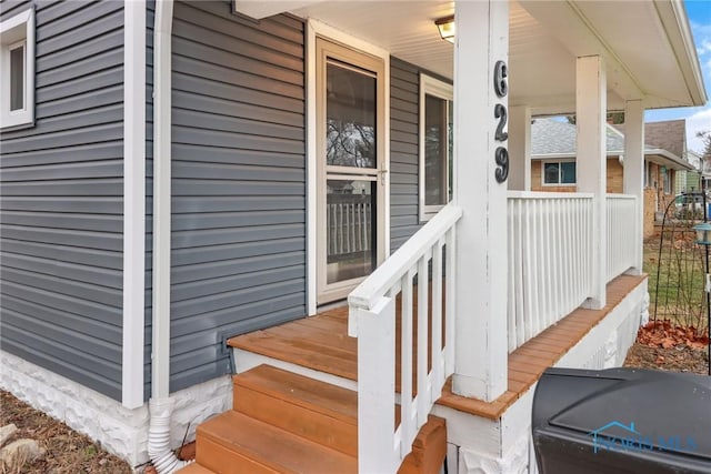 property entrance featuring covered porch