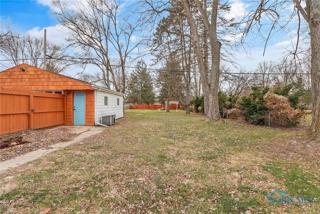 view of yard with central AC