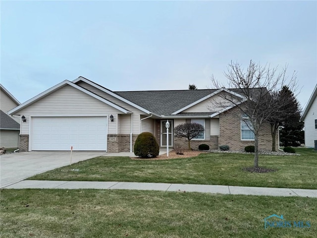 single story home featuring a garage and a front lawn