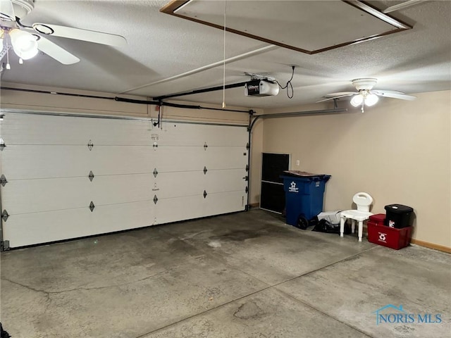 garage with ceiling fan and a garage door opener