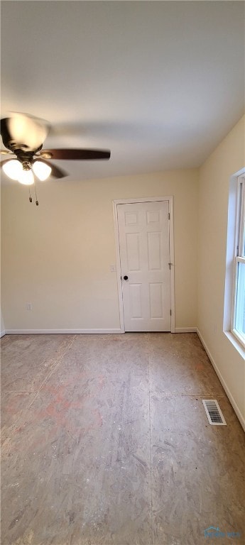 unfurnished room featuring ceiling fan