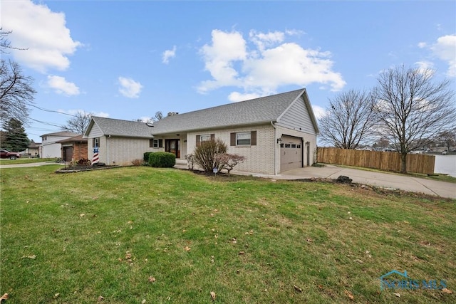 view of front facade featuring a front yard and a garage