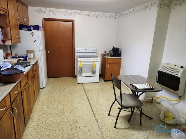 kitchen with heating unit and white appliances