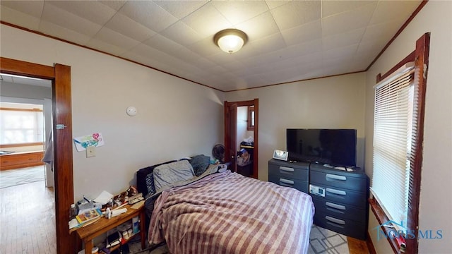 bedroom with light wood-type flooring