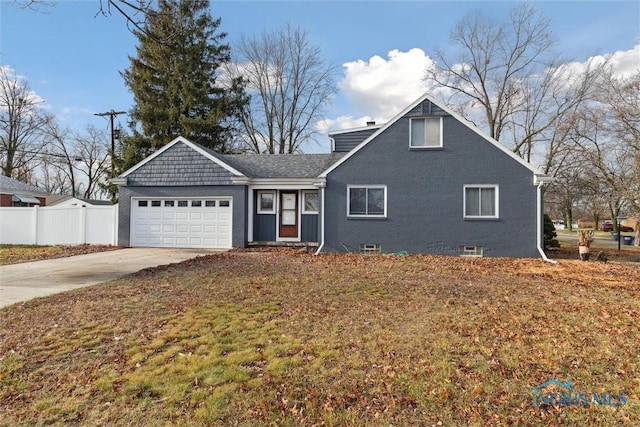 view of front of home with a garage