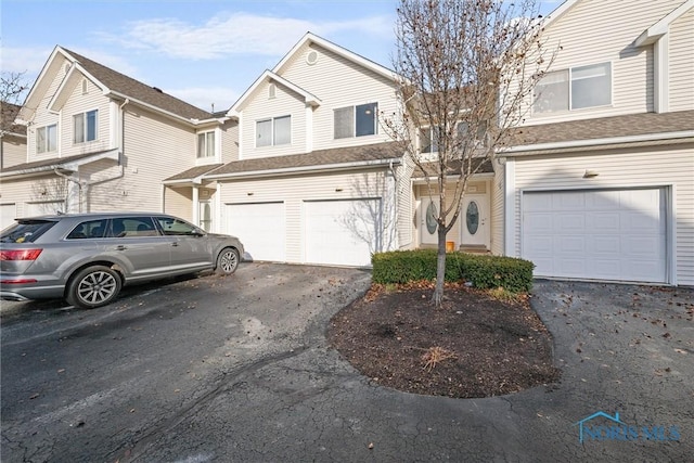 front of property featuring a garage