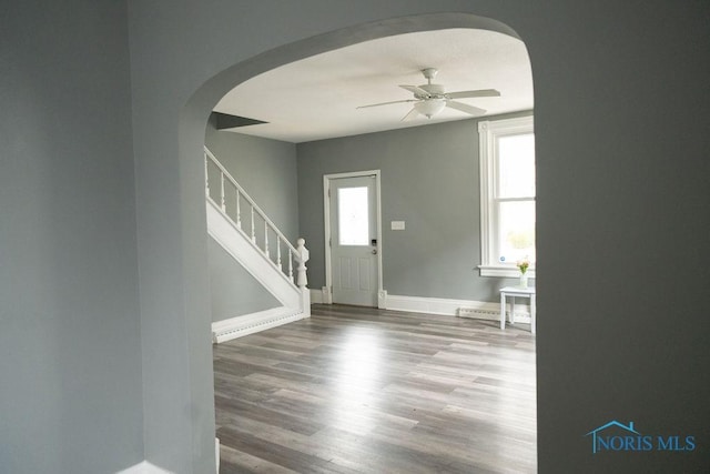 foyer with wood-type flooring and ceiling fan