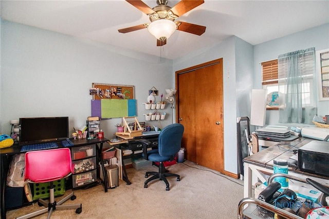 office with ceiling fan and light colored carpet