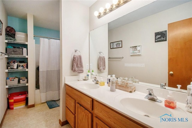 bathroom with vanity and shower / tub combo