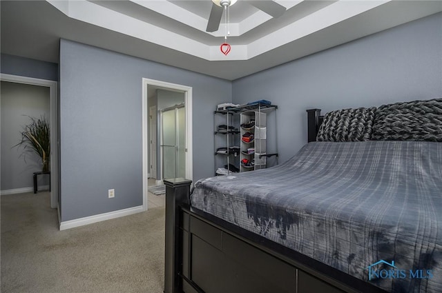 bedroom featuring light colored carpet and ceiling fan