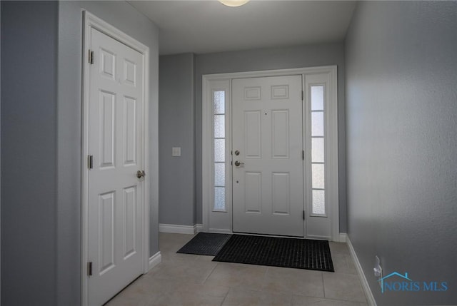 view of tiled foyer