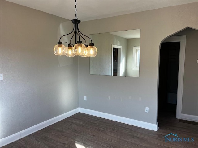 empty room featuring dark hardwood / wood-style floors