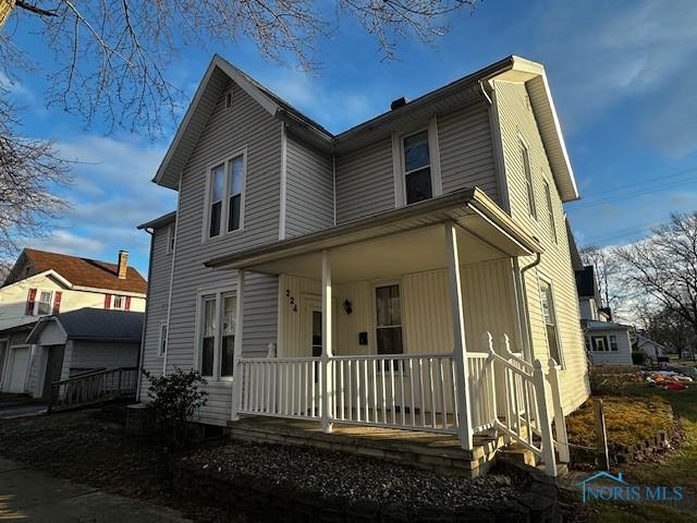 view of front of home featuring covered porch