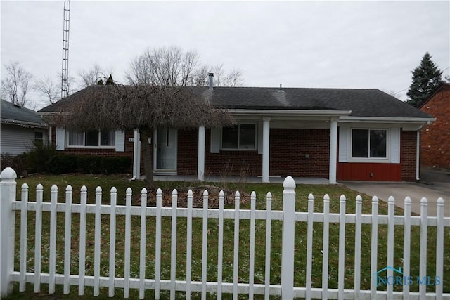 ranch-style house with a front yard