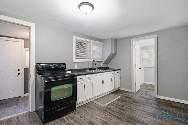 kitchen with white cabinetry, black range with electric stovetop, dark wood-type flooring, and sink