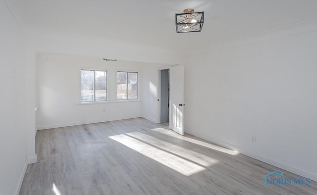 unfurnished room featuring light hardwood / wood-style flooring