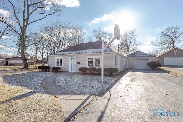 ranch-style house featuring a garage