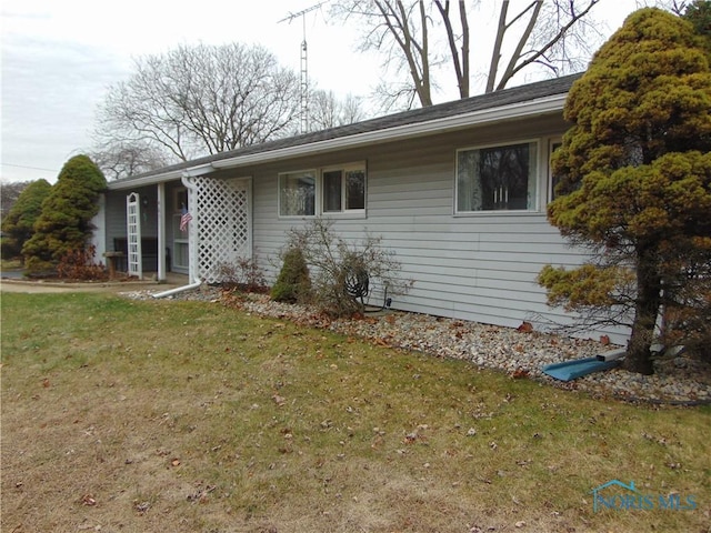 view of front of home with a front yard