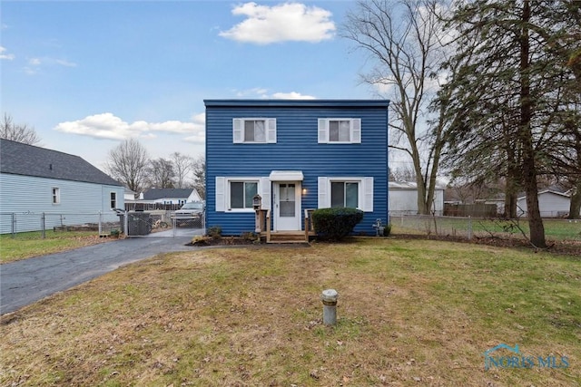 view of front of property with a front lawn