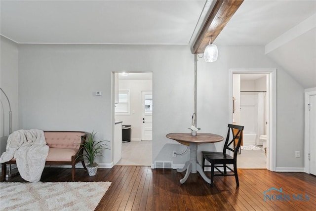 dining area featuring wood-type flooring