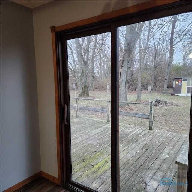 doorway to outside with hardwood / wood-style floors