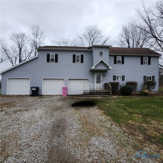 view of front of house with a garage