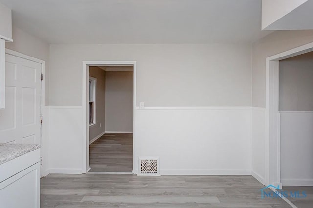 empty room featuring light hardwood / wood-style floors