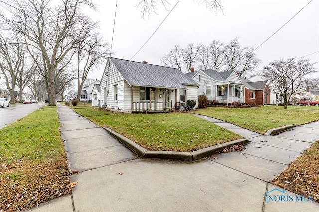 view of front facade with a porch and a front yard