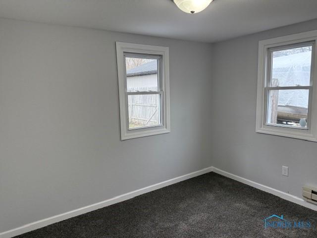 view of carpeted spare room