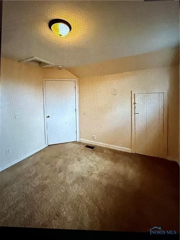 bonus room with vaulted ceiling