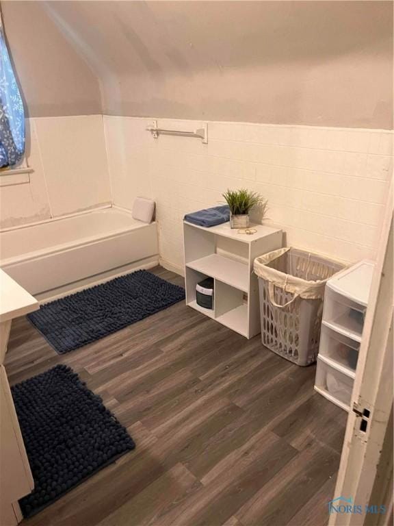 bathroom with hardwood / wood-style flooring