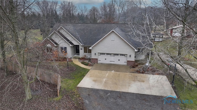 view of front of property featuring a garage