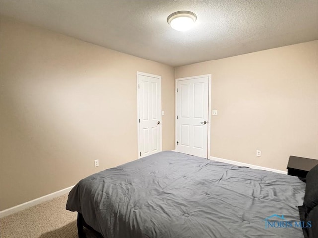 bedroom featuring carpet floors