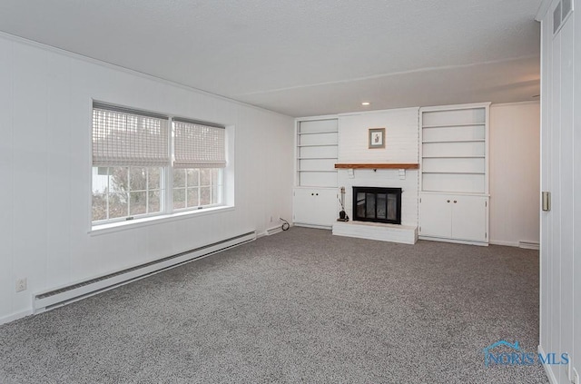 unfurnished living room featuring carpet flooring, a fireplace, and a baseboard heating unit