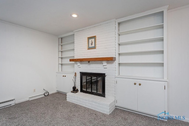 unfurnished living room with carpet, a fireplace, and a baseboard heating unit