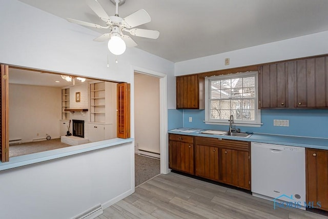 kitchen with light wood-type flooring, white dishwasher, ceiling fan, baseboard heating, and sink