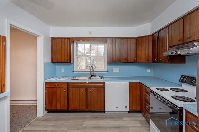 kitchen with light hardwood / wood-style flooring, white appliances, sink, and a baseboard radiator