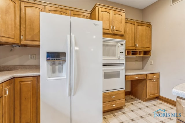 kitchen featuring white appliances