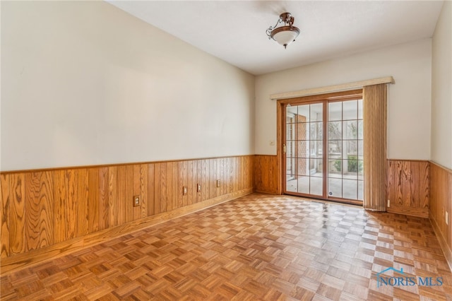 empty room with light parquet flooring