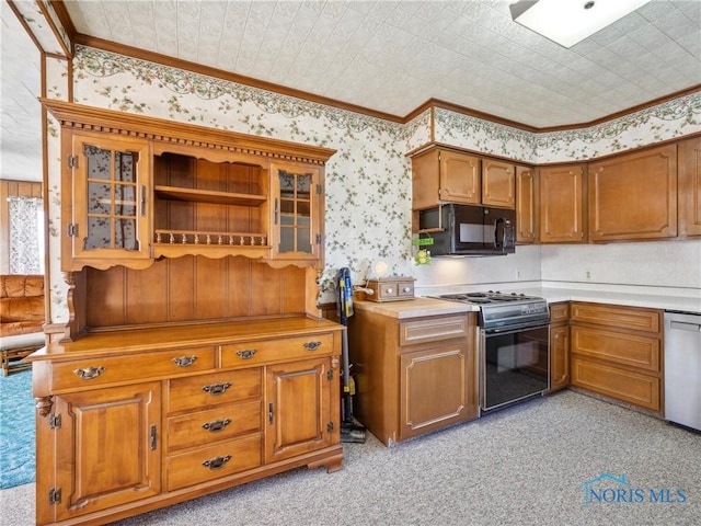 kitchen with light carpet, black appliances, and ornamental molding