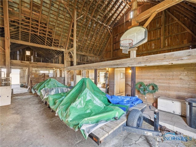 garage featuring wooden walls