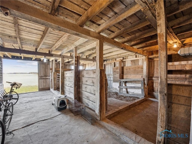 view of stable featuring a water view