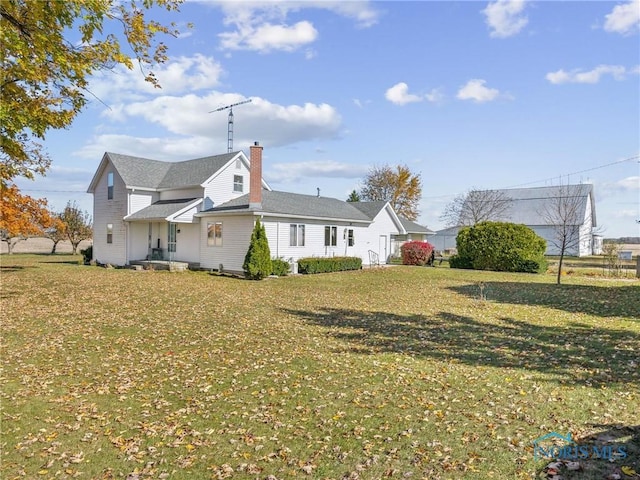 exterior space with a lawn