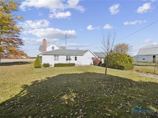 exterior space with a front lawn